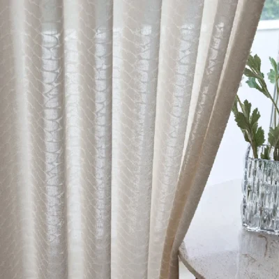 Close-up of Echo Leaf Curtain in textured jacquard voile softly flowing by the window