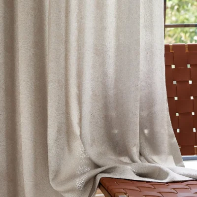 Close-up of dune-inspired textured jacquard curtain with elegant drape