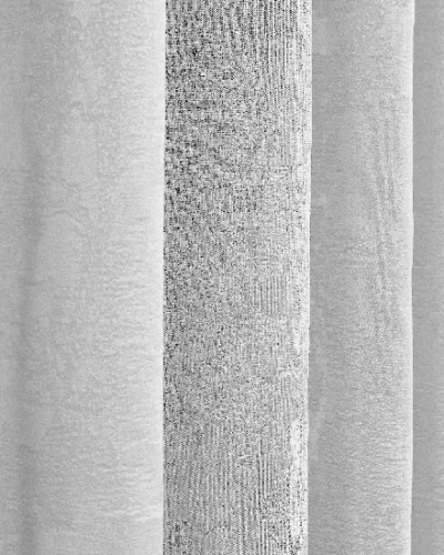 Dual veil jacquard curtain with central vertical textured stripe