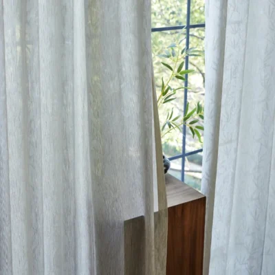 Close-up of Zen bamboo jacquard sheer curtain filtering natural light near a window