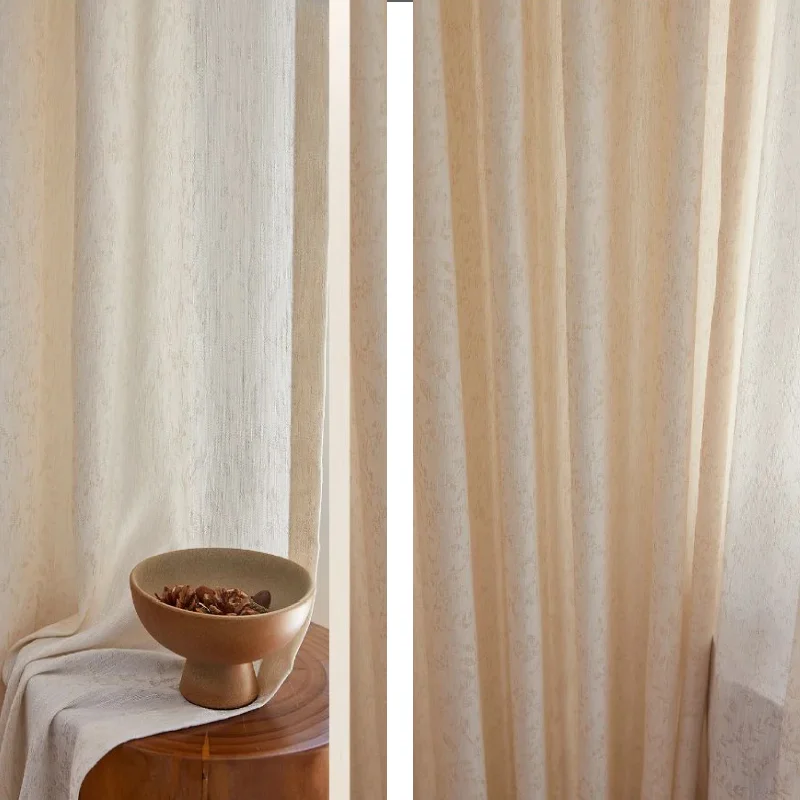 Close-up of botanical jacquard sheer curtain with soft light and wooden decor