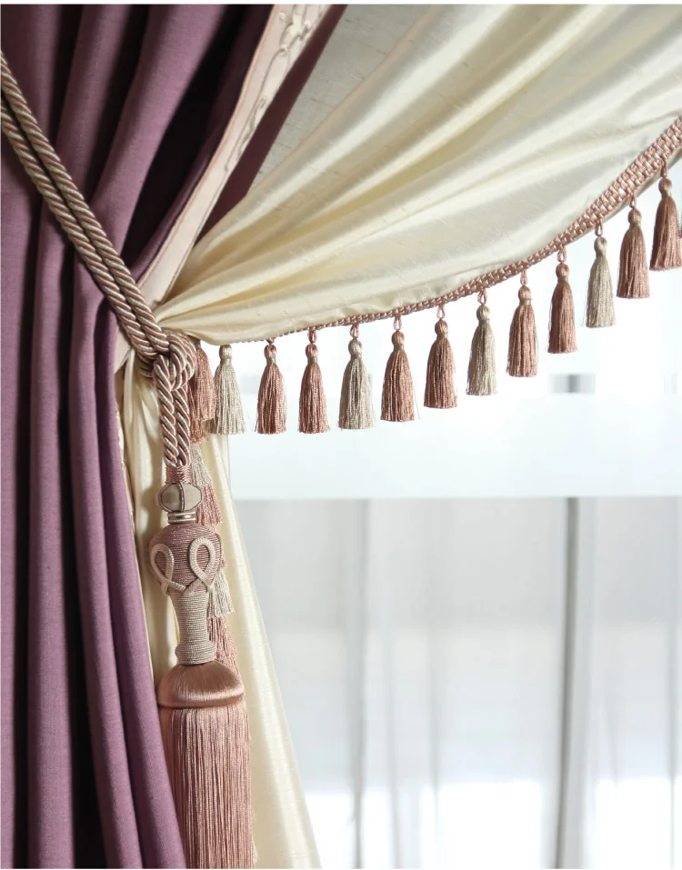 Two-tone curtain with tassel tieback – Elegant purple and cream drapery design