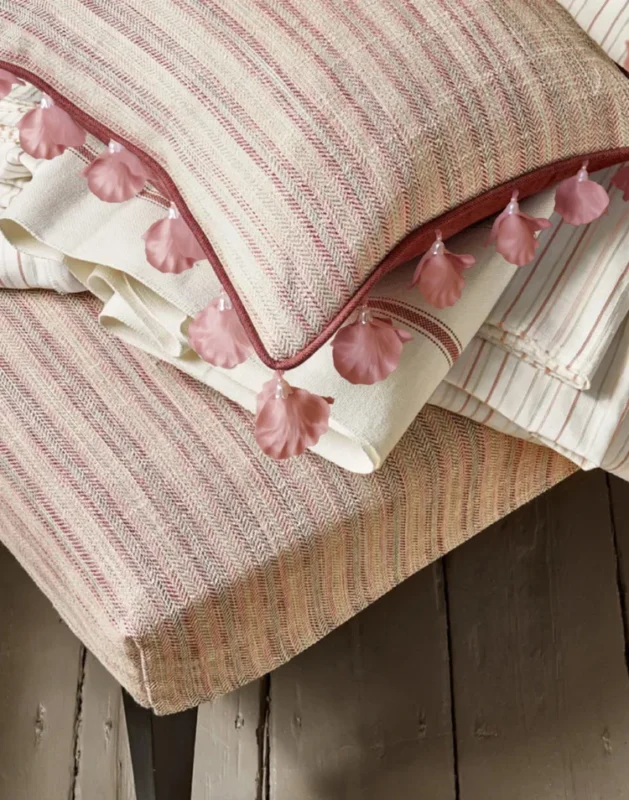 Romantic cushions trimmed with Nymph Garden Lace Curtain Trim in blush pink with pearl flowers