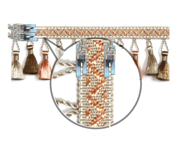 Close-up of French-style curtain tassel trim with orange and silver woven band