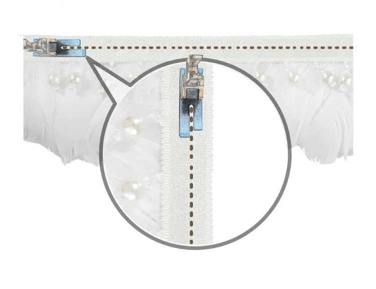 Close-up of white feather curtain trim attached to track rail