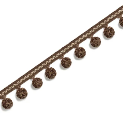 Woven pom pom trim for curtains in neutral tones