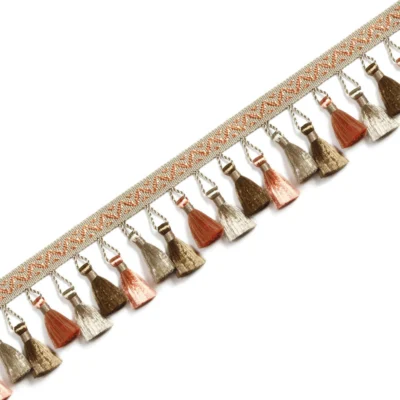 French-style curtain tassel trim in gold and beige with woven band
