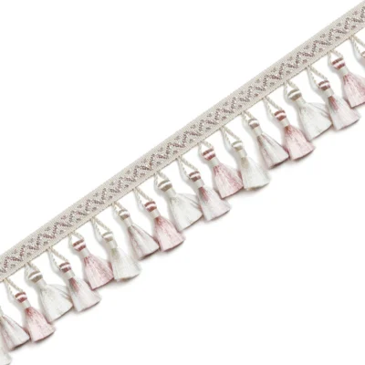 French-style curtain tassel trim in blush and ivory tones with woven band