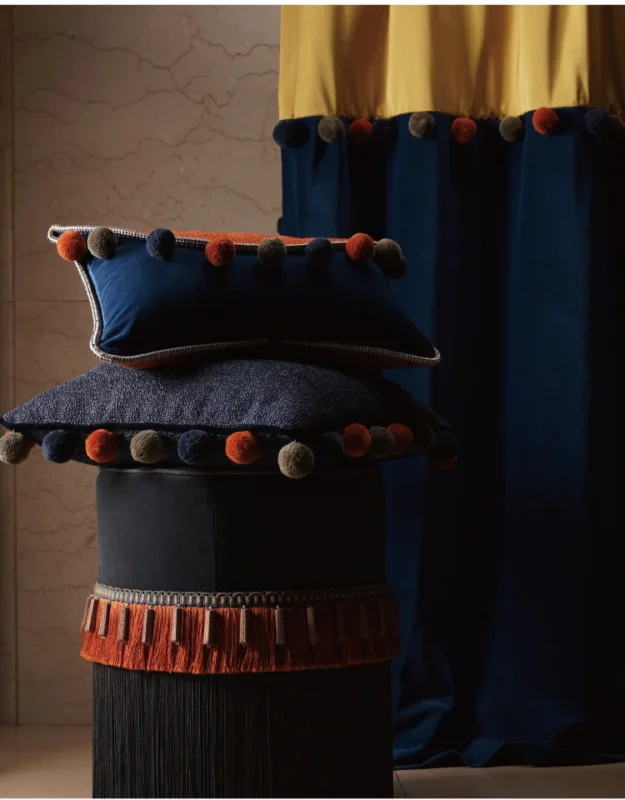 Cloud Dream Pom Pom Fringe on Stacked Cushions with Color Block Curtains