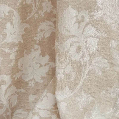 Warm beige floral jacquard sheer curtain pattern with vine motif, light filtering in sunlight