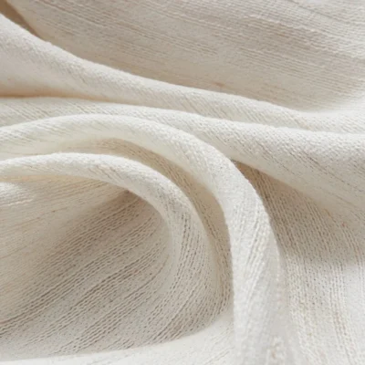 Oat Cloud Sheer Curtain texture close-up, creamy ivory semi-sheer fabric with subtle nubby weave