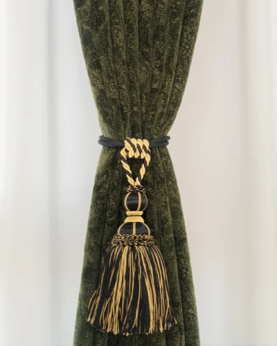 Leafshadow Jacquard Curtain with botanical texture by Lemonho, framing a calm reading corner with books and a tassel tieback