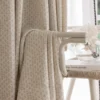 Basketweave texture curtain with soft woven drapes, close-up of textured curtain fabric in a neutral modern style.