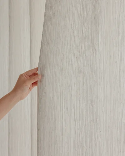 Ridge Texture Curtain – hand touching soft cream woven textured curtain fabric