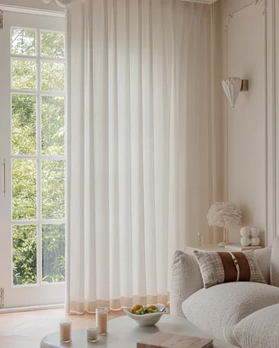 Ridge Texture Curtain – soft cream textured curtains in a modern living room with sofa and coffee table