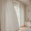 Ridge Texture Curtain – soft cream woven textured curtains in a bright living room