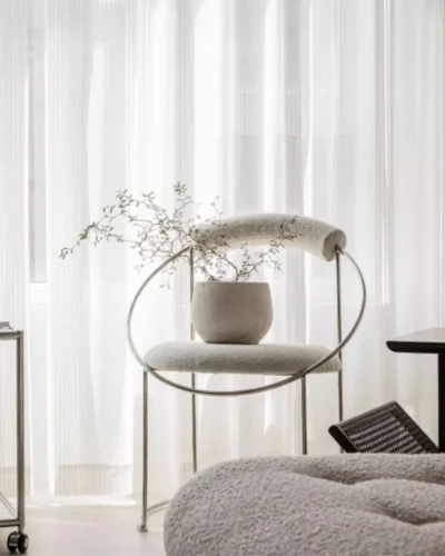 Vertical stripe sheer curtain in soft textured white voile, light-filtering window drapes in a modern living room