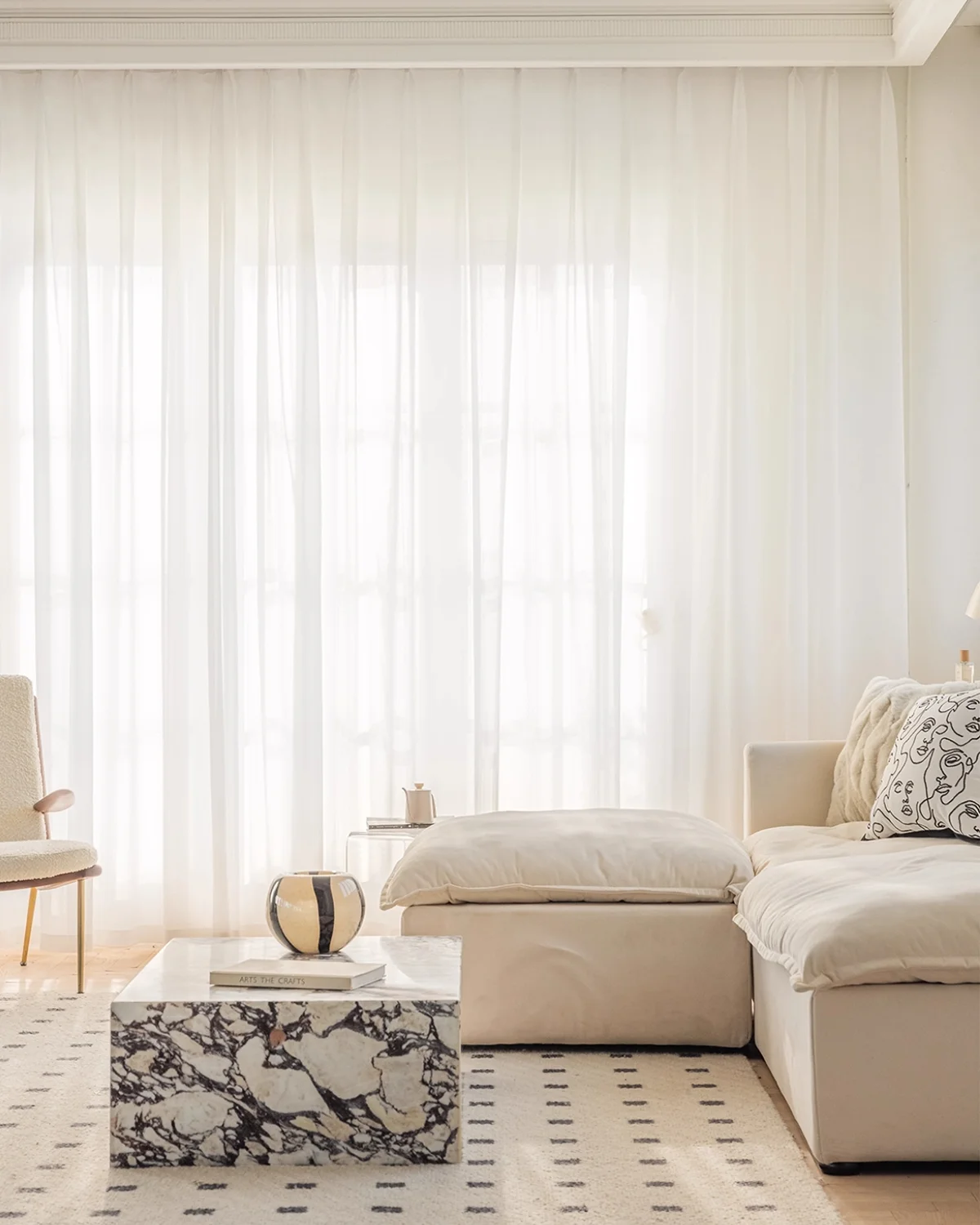 Cloudveil Sheer Curtain – white sheer curtains across a large window in a bright modern living room
