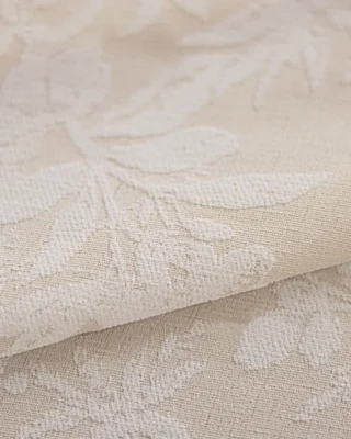 Close-up of Blossom Whisper sheer curtain, soft beige floral jacquard texture fabric