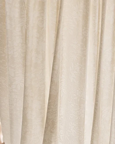 Blossom Whisper sheer curtain in beige floral jacquard, close-up of soft vertical folds