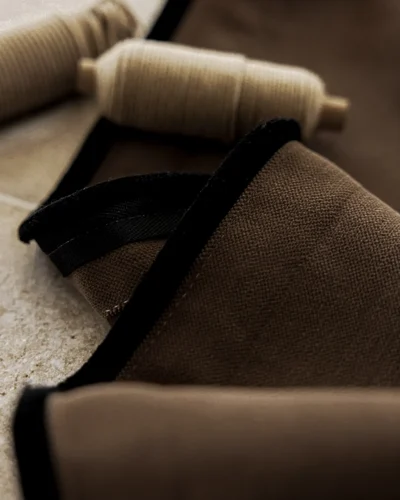 Mocha blackout curtain sewing detail with header tape and lining