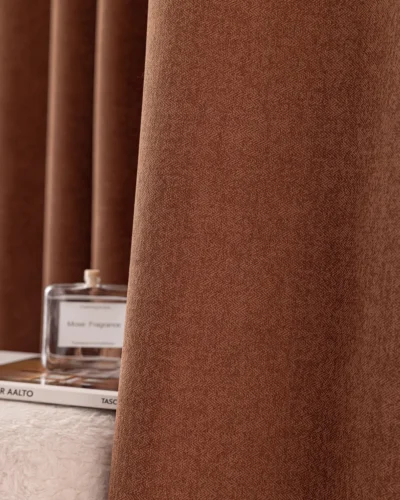 Cinnamon herringbone blackout curtain fabric close-up – warm brown textured drape and full privacy