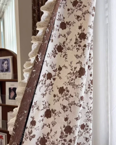 brown floral jacquard curtain detail showing vintage floral pattern and decorative trim edge