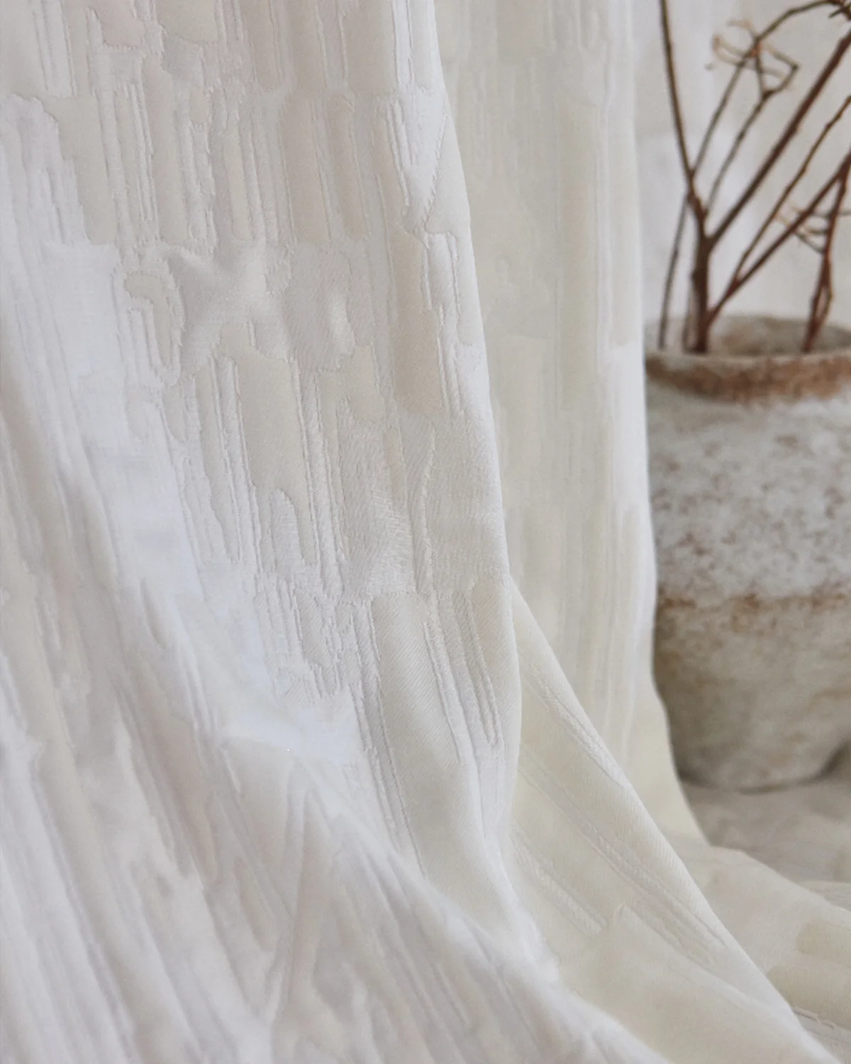 Cloudwash jacquard curtain with textured privacy relief, S-curve wave heading