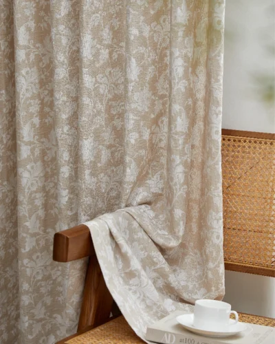 Floral jacquard sheer curtain in warm beige with vine pattern, light filtering and soft privacy in a cozy room
