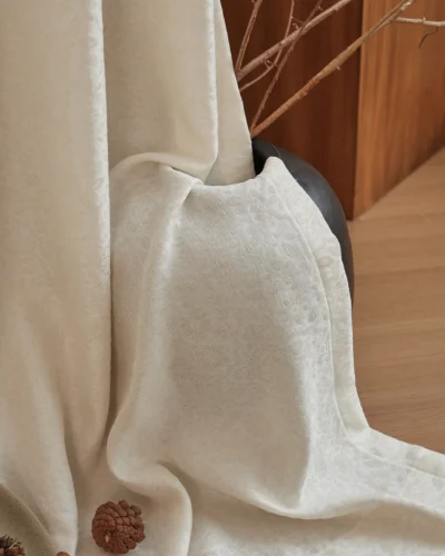 Relief jacquard sheer curtain in ivory, light filtering with soft privacy