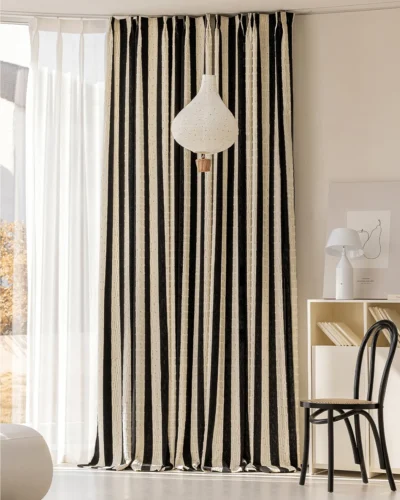 Whisper Stripe Curtain in a modern living room, black and cream textured stripe drapes