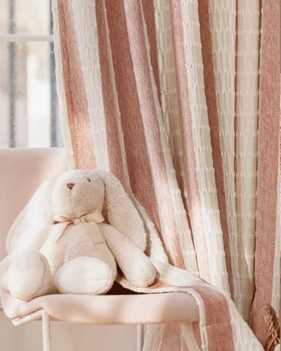 Whisper Stripe Curtain in blush pink, textured stripe drapes with soft daylight by the window