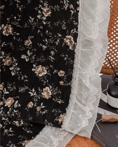 Midnight Rose jacquard curtain in Cocoa Bloom layered with white sheer curtain