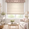 Tiny Tulip Jacquard Roman Shade in soft off-white with small blush tulip pattern, styled in a bright nursery window with a blue ruffle valance.
