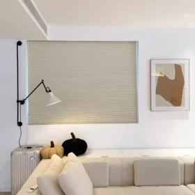 Custom honeycomb blinds in a modern living room with soft natural light