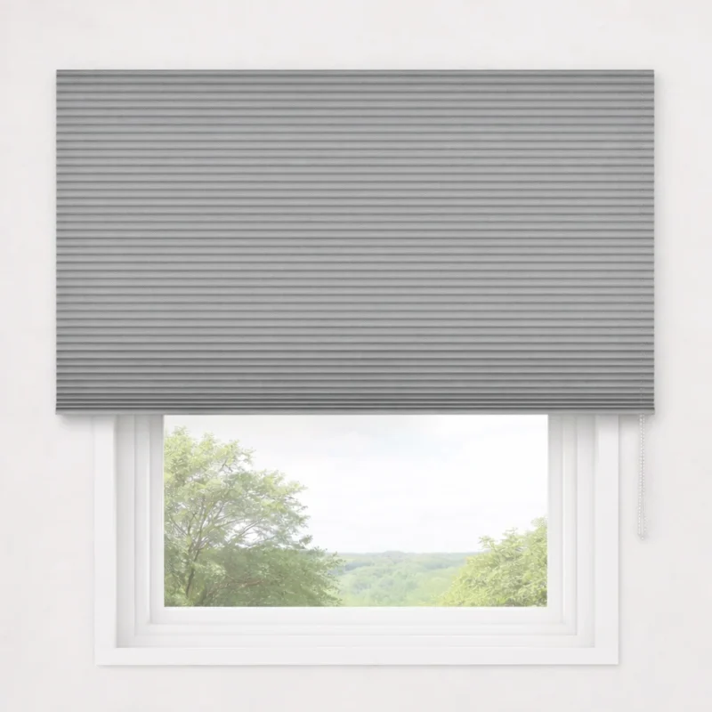 Outside-mounted semi-blackout honeycomb blind covering the window frame