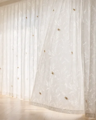 Dragonfly Embroidered Sheer in soft white fabric with light-filtering S-curve folds