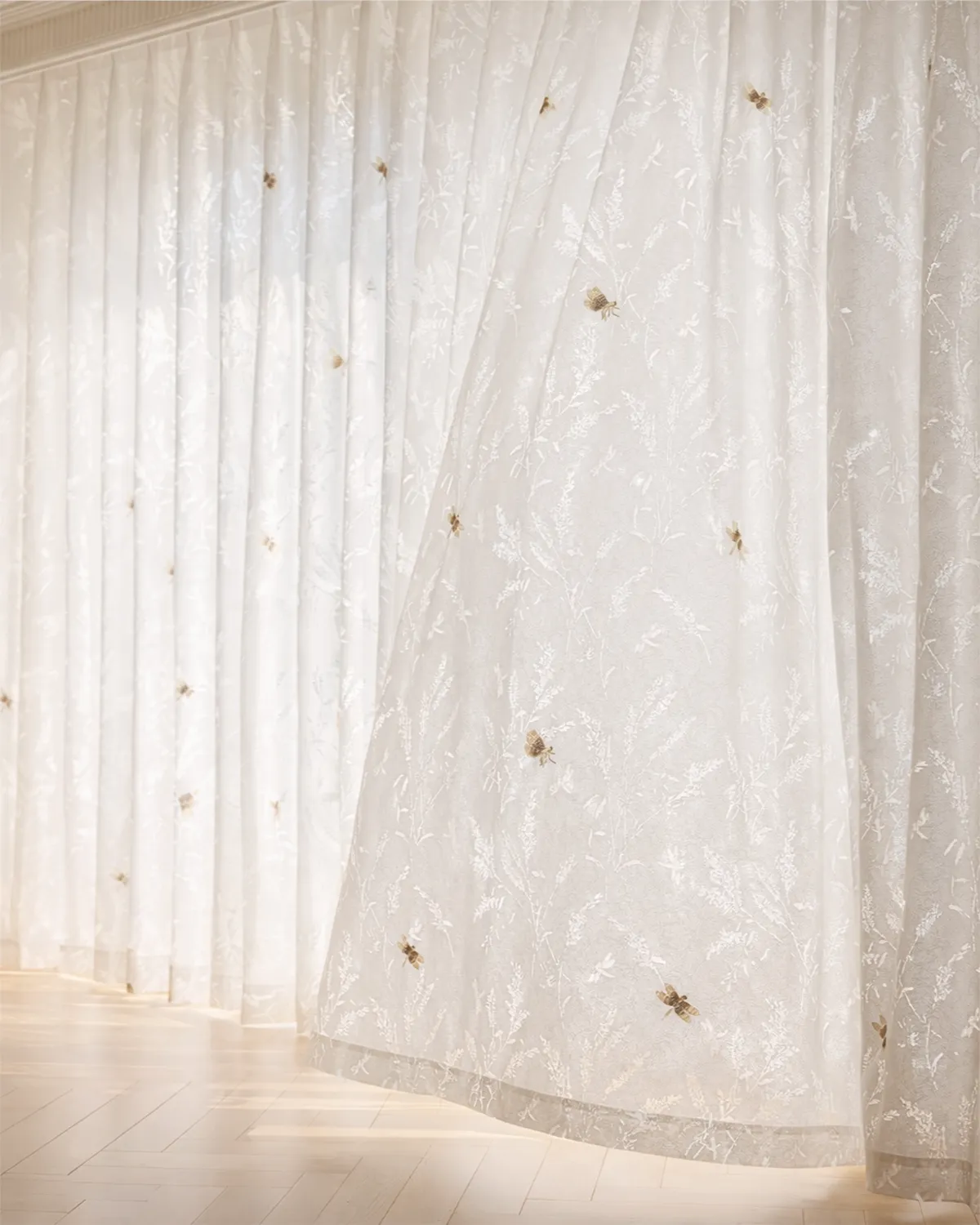 Dragonfly Embroidered Sheer in soft white fabric with light-filtering S-curve folds