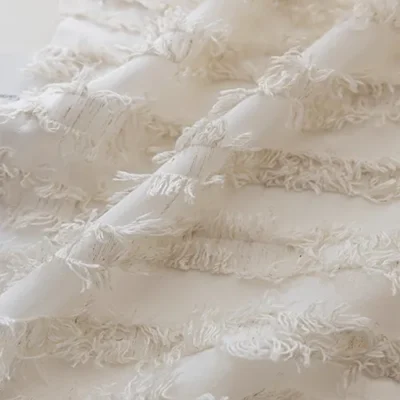 Frosted Feather Sheer Curtain in a soft neutral interior with airy light-filtering fabric and elegant S-curve drape
