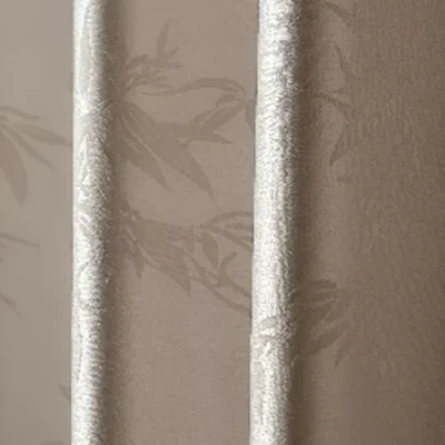 Close-up detail of Taupe Bamboo Shadow Curtain fabric with subtle bamboo-inspired pattern