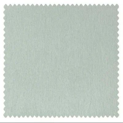 Light green blackout curtain fabric swatch with fine woven texture