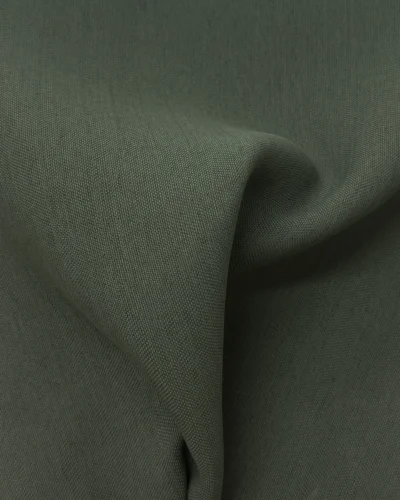 Whisper Weave blackout curtain fabric detail in olive green with soft texture