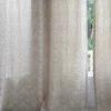 Botanical linen curtain made from 100% natural linen with soft leaf pattern in a modern interior