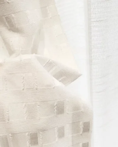 Close-up of Ivory Grid Sheer Curtain fabric showing soft woven texture and subtle geometric pattern