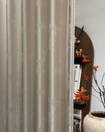 Drift Bamboo Sheer Curtain in warm taupe with soft light filtering and subtle bamboo shadow texture