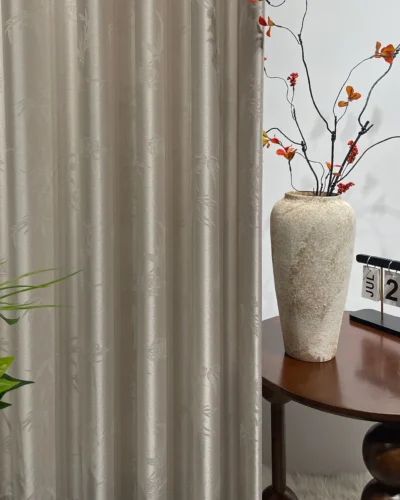 Taupe Bamboo Shadow Curtain side view with soft folds and subtle bamboo pattern