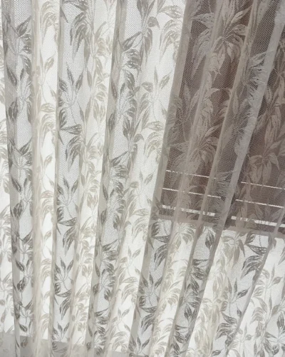 Close-up view of Willow Lace Sheer Curtain with delicate botanical lace detail
