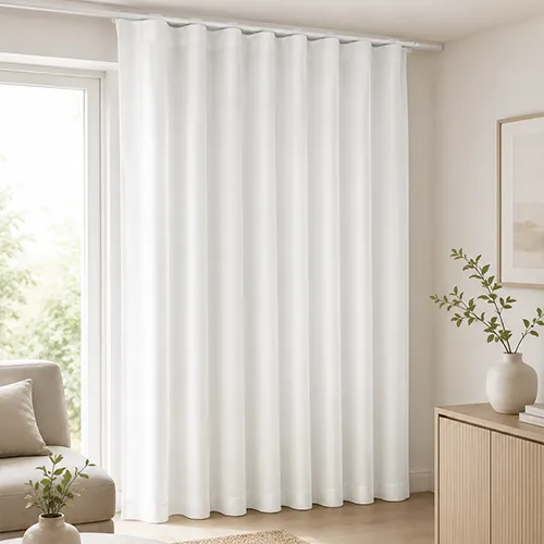 S-Wave curtains in a modern bedroom with soft folds and natural light