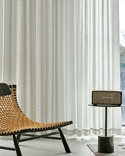 Light sheer curtains in a bright interior with soft natural daylight