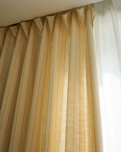 Cotton-rich linen texture curtain with golden stripes and soft pleats
